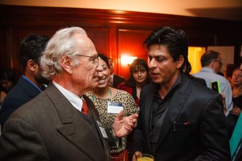 Shah Rukh Khan speaks to guests at Timothy Dwight College Fellows reception
