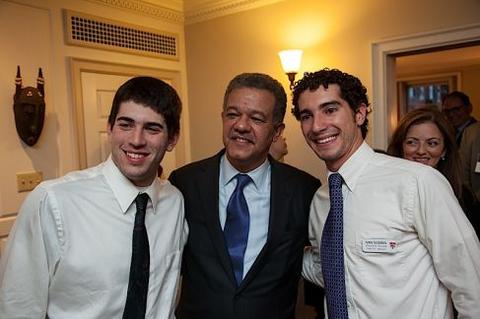 Leonel Fernández poses with guests at Chubb Fellowship reception