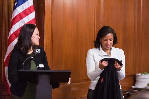 Mary Lui presents Susan Rice with gifts from the Chubb Fellowship