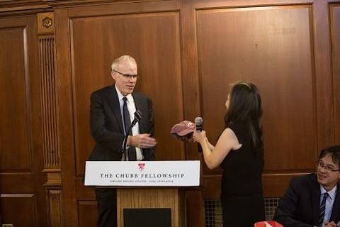 Mary Lui presents Bill McKibben with Chubb Fellowship gifts